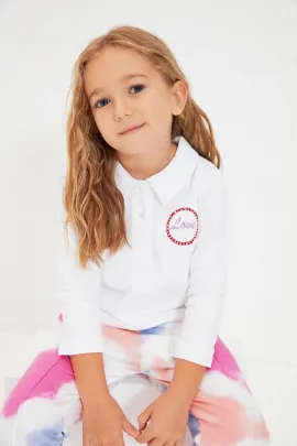 Gyzlar üçin futbolka TRENDYOLKIDS, Reňk: Ak, Ölçeg: 6-7 ýaş