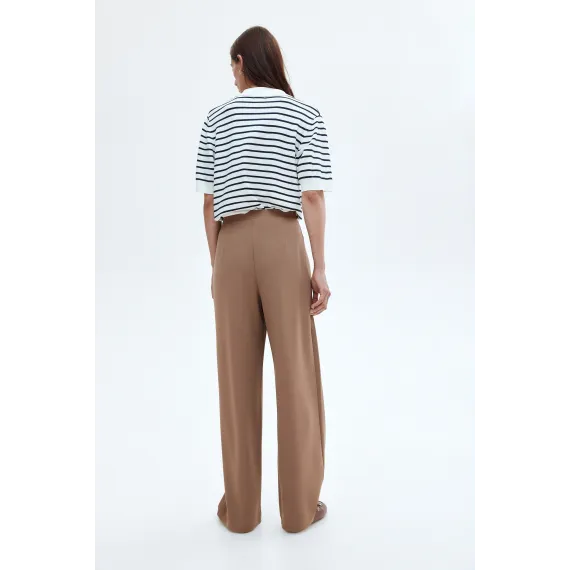 Брюки с деталями в виде завитков H&M, Цвет: Бежевый, Размер: M, изображение 4 - в интернет-магазине Туркменистана Wabrum Брюки с деталями в виде завитков H&M, Цвет: Бежевый, Размер: M, изображение 4